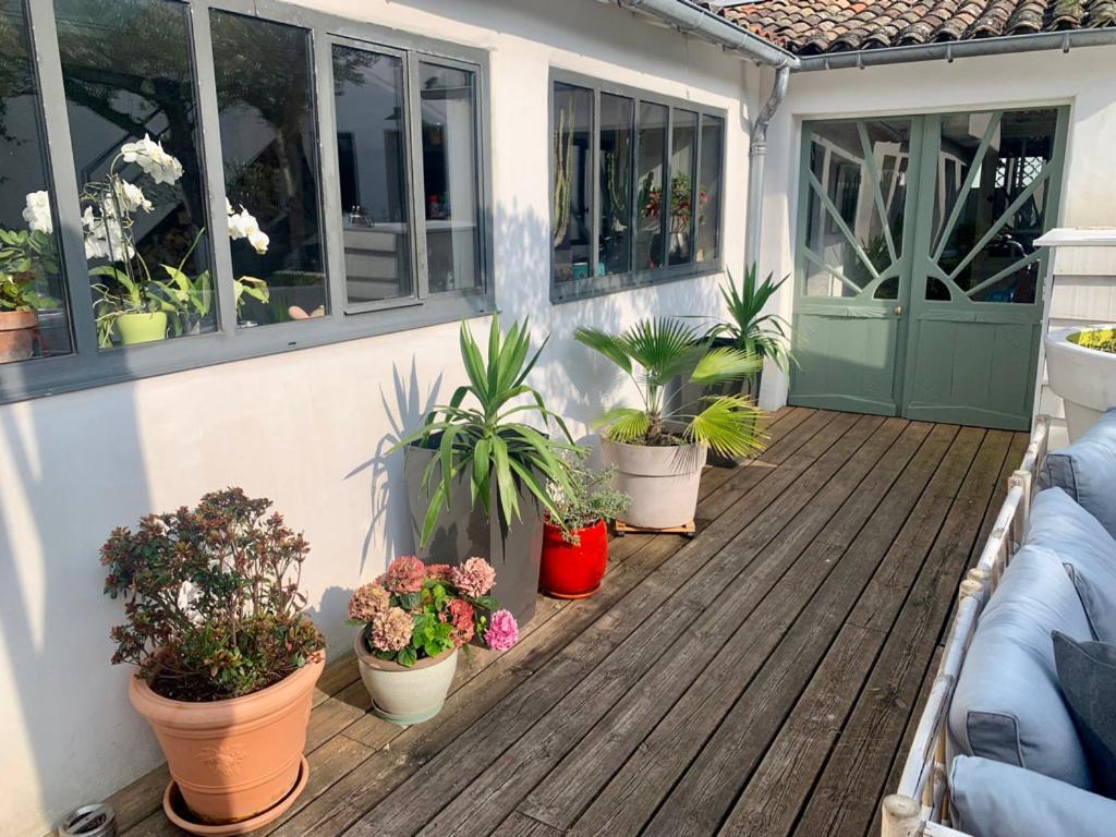 Maison Face Au Soleil เลอบัวส์-ปลาจ-อ็อง-เร ภายนอก รูปภาพ